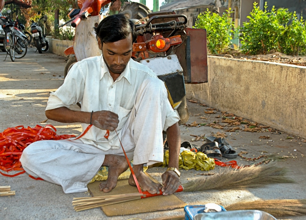 Broom maker